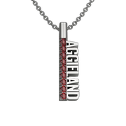 AggieLand silver pendant with maroon garnets on a gray background.